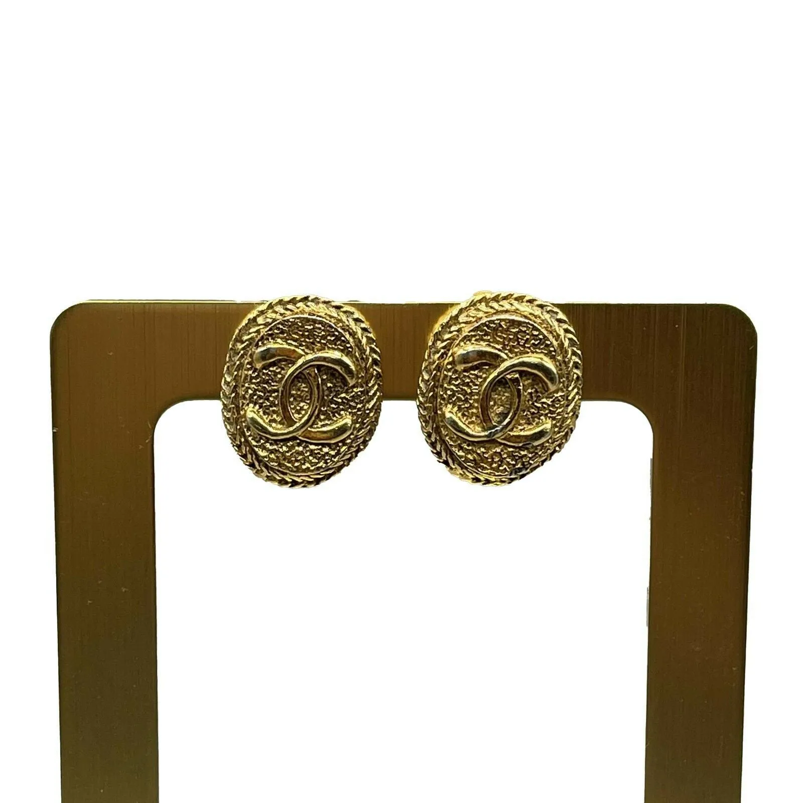 CHANEL - Vintage 1970's CC Textured Oval Medallion Clip-On / Gold-tone Earrings