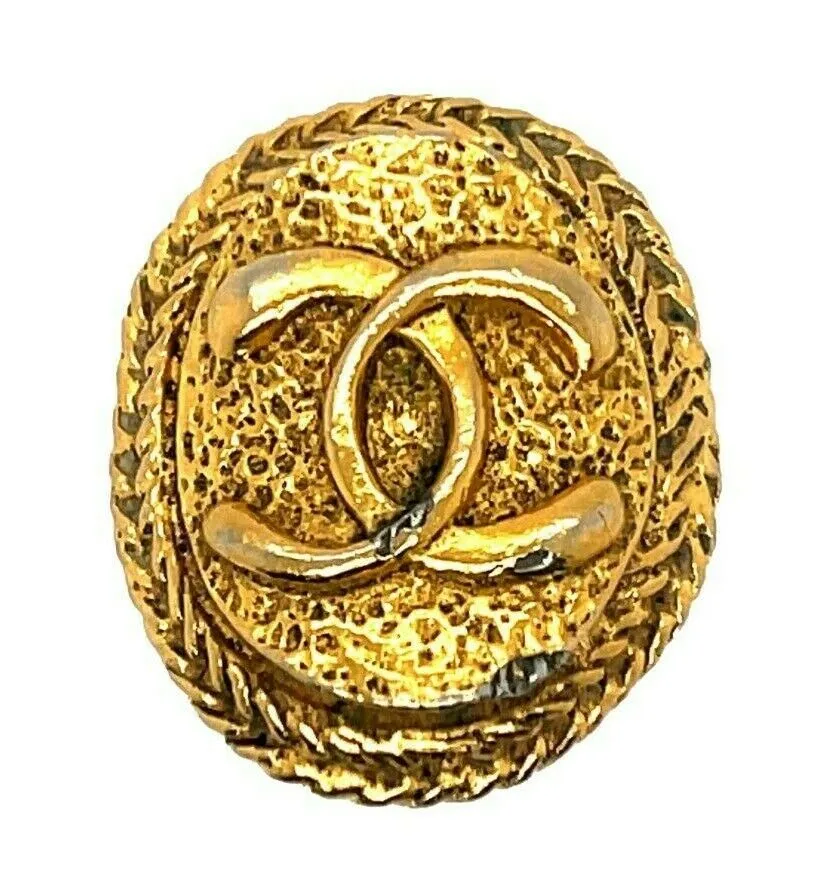 CHANEL - Vintage 1970's CC Textured Oval Medallion Clip-On / Gold-tone Earrings