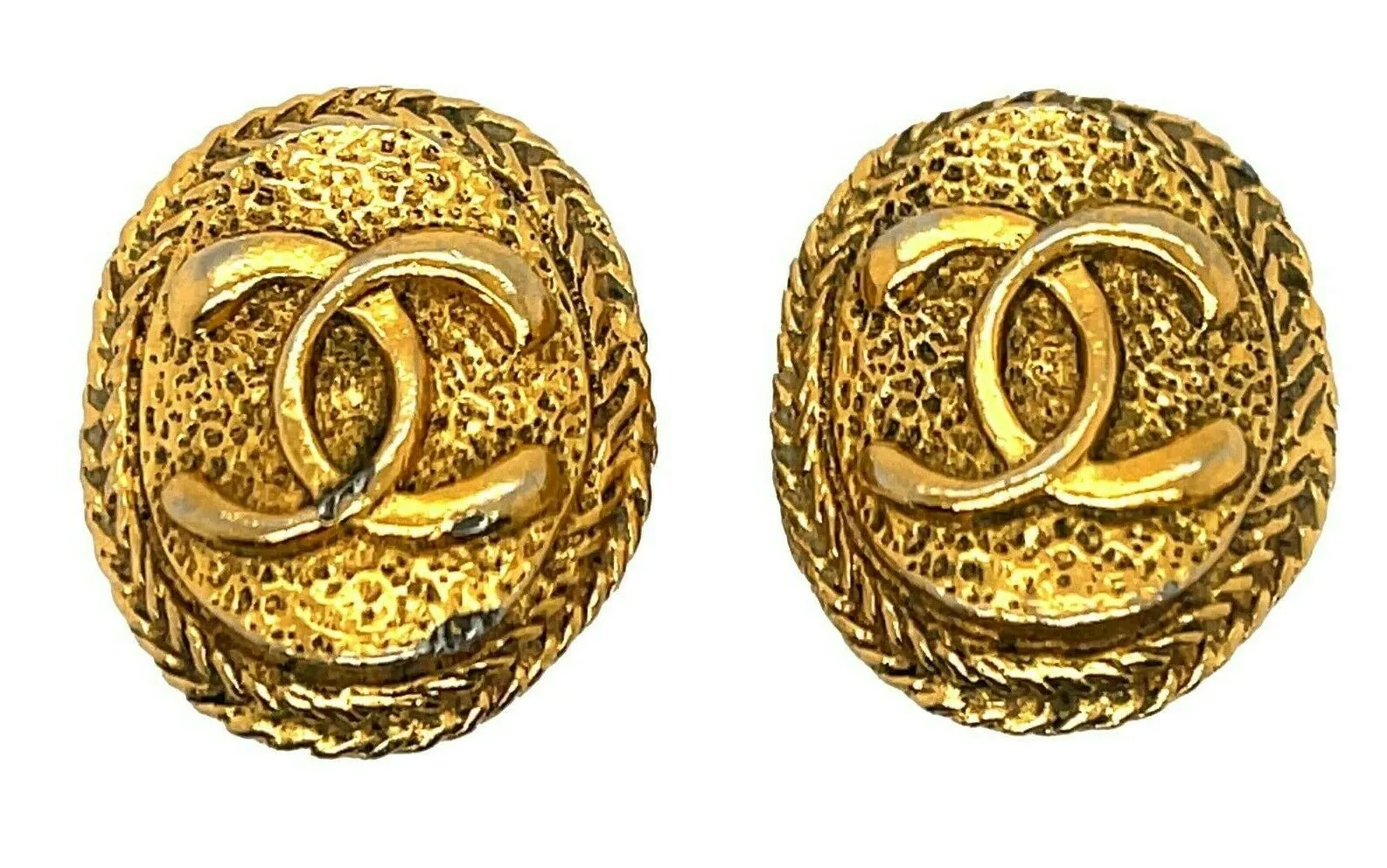 CHANEL - Vintage 1970's CC Textured Oval Medallion Clip-On / Gold-tone Earrings