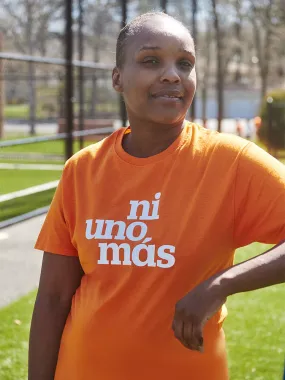 Ni Uno Más Wear Orange Tee