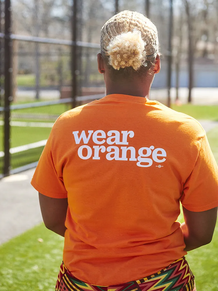 Ni Uno Más Wear Orange Tee